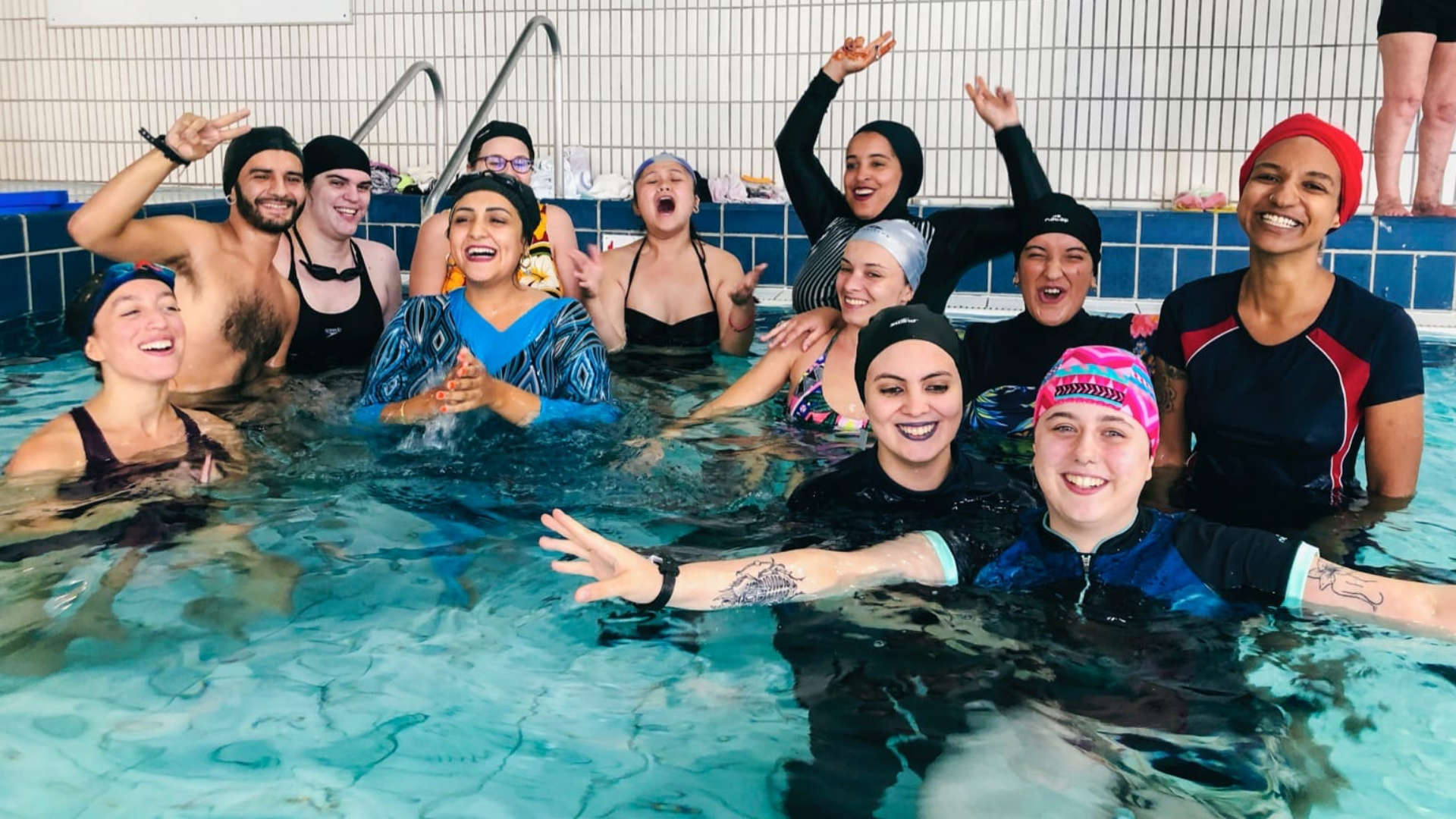 Muslim women defy ban to swim in burkinis at French pool - BBC News