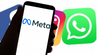 Logo of Meta in front of Facebook, Instagram and WhatsApp logos