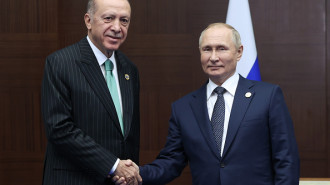 Erdogan (left), Putin (right)