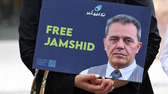 	A demonstrator holds a picture of Iranian-German Jamshid Sharmahd, who has been sentenced to death in Iran, and with the lettering 'Free Jamshid' during a demonstration for his release in front of the German Foreign Ministry in Berlin on July 31, 2023.