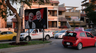 Photos of General Qassem Soleimani and Abu Mahdi al-Muhandis who were assassinated by direst orders of Donald Trump are displayed in the middle of Abu Nuwas street on March 16, 2023 in Baghdad, Iraq.