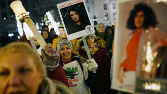 People attend a torchlight procession to greet the 2023 Nobel Prize laureate following the Nobel Peace Prize award ceremony in Oslo, Norway on December 10, 2023. 