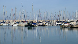 A picture shows boats moored at the marina in the Israeli coastal city of Ashkelon on January 8, 2024.