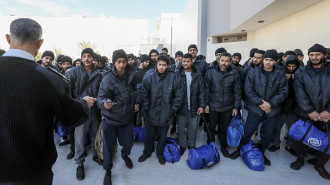 llegal migrants from Egypt wait during a deportation operation in the Libyan capital Tripoli on January 31, 2024. The body responsible for fighting against illegal immigration in Libya, in coordination with the International Organisation for Migration (IOM), organised the return of 350 illegal Egyptians to their country. 