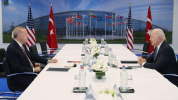 Turkish President Recep Tayyip Erdogan (L) and US President Joe Biden (R) meet at the NATO summit in Brussels, on 14 June, 2021. [Getty]