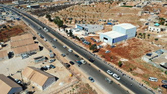 Aid groups repeatedly protested the possible closure of the Bab al-Hawa border crossing [Getty]