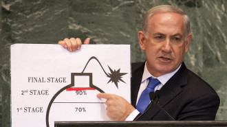 Benjamin Netanyahu, former Prime Minister of Israel, speaking about Iran's nuclear program to the United Nations General Assembly. [Getty]