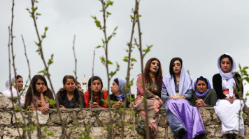 Iraqi Yazidi women near Dohuk celebrate the Yazidi New Year on 16 April 2019. [Getty]