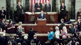 US President George W Bush speaks to Congress on 20 September 2001 in Washington, DC. [Getty]