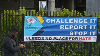 An anti-racism banner hangs on railings outside Headingley, the home of Yorkshire cricket on November 5, 2021