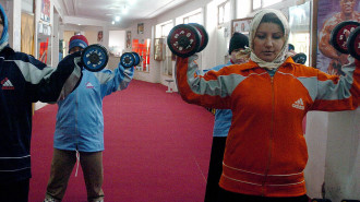 Afghan women exercise at a the Salar Afghaqn Gym in Herat, 11 January 2006 [Getty Images]