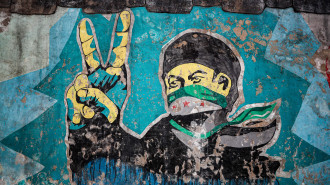 A picture taken on February 15, 2020, shows a mural inspired by the 2011 Syrian uprising in the deserted city of Kafranbel, south of Idlib city in the eponymous northwestern Syrian province, amid an ongoing pro-regime offensive