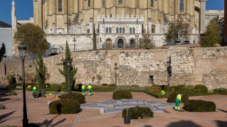 The remains of a 9th century Islamic lie overshadowed by the Almudena Cathedral, the biggest in the city