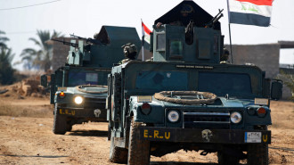 Two Iraqi army trucks