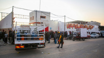 Palestinians are in the queue to refill their gas cylinders at a gas station. The shortage of gas and the inability to fill the gas cylinders in their homes makes the winter difficult for Palestinians, as gas is one of their heating sources. The crisis is repeated almost every year at this time as a result of the increasing need for gas. The lack of a strategic reserve of gas of the stations, the Gaza strip obtains gas through the Rafah crossing from Egypt or the Israeli side. (Photo by Ahmed Zakot/SOPA Ima