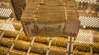 Sudanese twenty pound bills in stacks