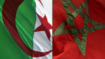 The Algerian flag (left) next to the Moroccan flag (right)