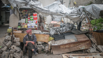 A lone market trader [Getty Images]