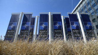 Multiple NATO logos outside the alliance's headquarters