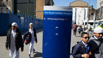 Main entrance to the Royal London Hospital in East London, England, United Kingdom. Britain's biggest new NHS hospital The Royal London and Barts state-of-the-art new building which will sit behind the historic front block overlooking the Whitechapel