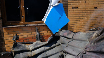 Damage to a building after Russian shelling in Bakhmut in Ukraine.