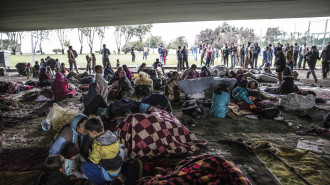 Afghan refugees seeking to reach Europe are seen under a viaduct where they have been staying for about three months in Zeytinburnu District of Istanbul, Turkey [Getty Images]