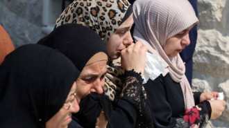 Palestinians mourning in Qabatiya / Getty