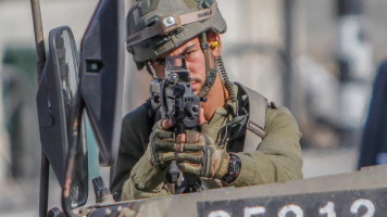 Israeli soldiers sealed off the entrances to Nablus on Wednesday [Getty]