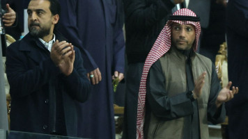 Iraq's Parliament Speaker Muhammad al-Halbousi (L) and Kuwait's Parliament Speaker Marzouq al-Ghanim attend the Arabian Gulf Cup football match b