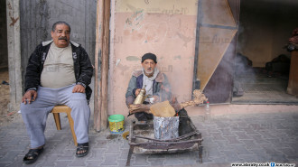 Two elderly men in Yibna camp [Mohammed Alhajjar/Al-Araby Al-Jadeed]