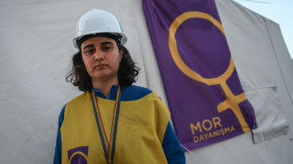 Selver Buyukkeles, 28, member of Mor Cati (Purple Roof) Women's Solidarity Feminist group, poses during an interview in Hatay on March 6, 2023, one month after a massive earthquake struck southeastern Turkey