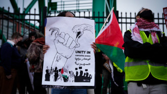 Pro-Palestinian activists stage protest at event in Baltimore. [Photo courtesy of Ryan Harvey/Rebel lens]