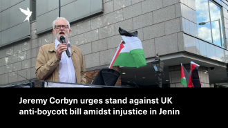 Corbyn speaking at Protest