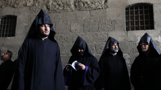 Armenian clergymen attend the funeral procession of the 96th Armenian Patriarch of Jerusalem Torkom Manougian II at St. James Cathedral in Jerusalem's old city on October 22, 2012. Manougian, who passed away on October 12 at the age of 93, was buried in a funeral attended by representatives of all the Christian Churches of the Holy Land. AFP PHOTO/GALI TIBBON (Photo credit should read GALI TIBBON/AFP via Getty Images)