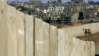 An Egyptian border post overlooks Israel's protective barrier and the Palestinian town of Rafah September 11, 2005