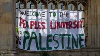 : Pro-Palestinian students from the University of Oxford take part in an encampment with dozens of tents outside the Pitt Rivers Museum to call for a full divestment from Israel and boycott of Israel-linked companies in Oxford, United Kingdom on May 10, 2024. (Photo by Muhammed Yaylali/Anadolu via Getty Images)