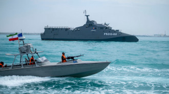 The IRGC Navy Martyr Hassan Bagheri warship and an IRGC speed boat are sailing along the Persian Gulf during the IRGC marine parade