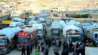 Trucks carrying Syrian refugees and their belongings prepare to leave Lebanon back to Syria, in Arsal in the Bekaa Valley, on May 14, 2024.