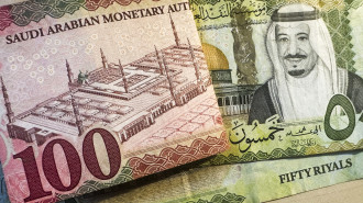 100 and 50 Saudi Riyal notes