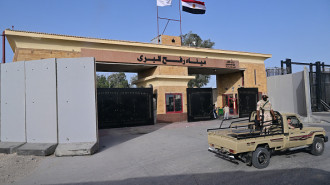 Egyptian army soldiers guard their side of the Rafah crossing, closed since early May, on July 4, 2024, as the conflict between Israel and the Palestinian Hamas movement continues. [Getty] 