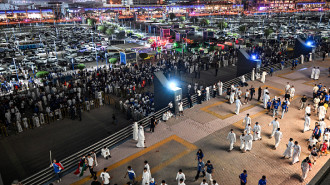 Spectators gather outside Jaber al-Ahmad International Stadium in Kuwait City on September 10, 2024 before the 2026 FIFA World Cup Asian qualification football match between Kuwait and Iraq. (Photo by Yasser AL ZAYYAT / AFP via Getty Images)