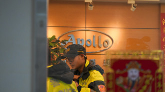 Police officers are seen at Taiwanese company Gold Apollo office in New Taipei, Taiwan, September 18, 2024. (Photo by Walid Berrazeg/Anadolu via Getty Images)