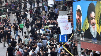 People react after a device explosion occurred during the funeral of people killed when hundreds of paging devices exploded across Lebanon the previous day, in Beirut's southern suburbs on September 18, 2024. Photo by Fadel (Photo by Fadel ITANI/AFP