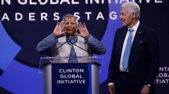 Bangladesh's interim leader Muhammad Yunus speaks next to former US President Bill Clinton (R) during the Clinton Global Initiative annual meeting in New York City on September 24, 2024. 