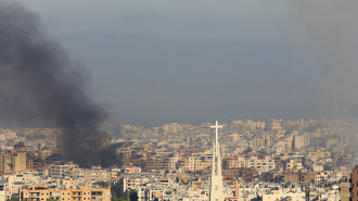 A picture taken from the hills east of Beirut shows smoke billowing during Israeli airstrikes on the southern suburbs of the Lebanese capital early on September 28, 2024. 