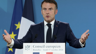 President of France Emmanuel Macron speaks to the media during a press conference following the European Council summit at Batiment Europa 