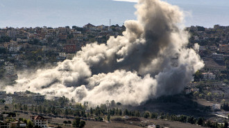 Smoke clouds rise following an Israeli air strike on the village of Khiam (Photo by -/AFP via Getty Images)