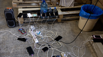 Mobile phones are charging as people who fled the Israeli attacks at night and took refuge underground continue their lives on the shelters during the day on October 21, 2024 in Beirut, Lebanon. (Photo by Ugur Yildirim/ dia images via Getty Images)