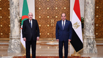 Algerian President Abdelmadjid Tebboune (L) is welcomed his Egyptian counterpart Abdel Fattah el-Sisi (R) 