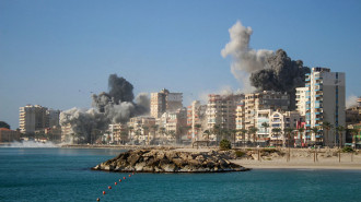 Smoke billows from the site of Israeli airstrikes on a neighbourhood in the southern Lebanese city of Tyre on October 28, 2024. (Photo by KAWNAT HAJU/AFP via Getty Images)